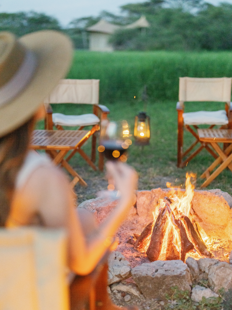 a person by a campfire